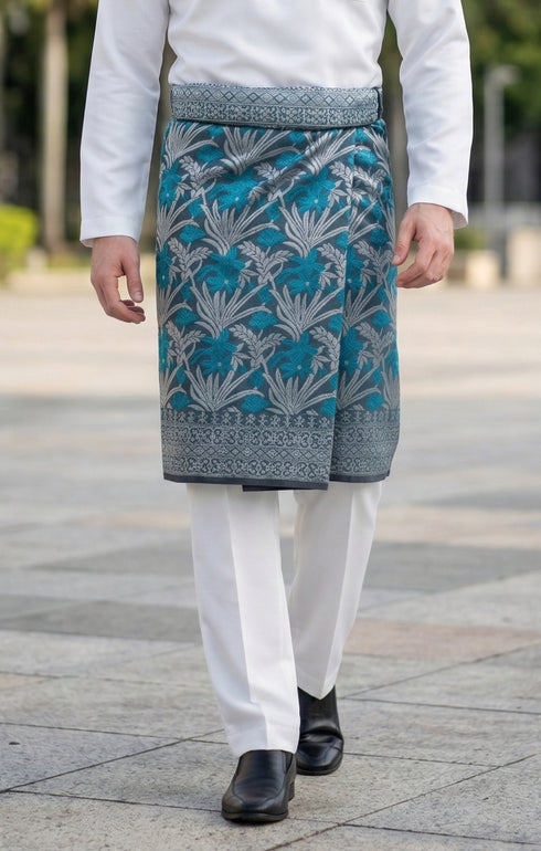 Person wearing a traditional outfit Sampin Instant Kasturi Teal Blue traditional tenun pattern instant sampin outdoor background