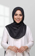 Woman wearing a Semi Instant Shawl HIjab Black Front view highlighting flowy edge and generous width and white blouse against a light gray background