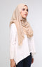 Woman wearing a Nude Semi instant shawl plain front drape view showing full length and soft chiffon texture on a gray background