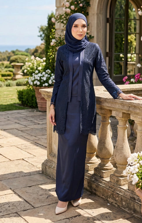 Woman wearing baju kebaya Kutu Baru Navy Blue front view showing V-neck collar, long sleeves, and French lace detailing