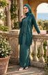 Woman wearing kebaya Kutu Baru Teal Green front view showing V‑neck collar and French lace detailing