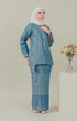 Model wearing C Luxe Kurung Kedah Teal Blue displaying overall styling and drape