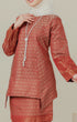 Fabric close up C Luxe Kurung Kedah Maroon showing dyed brocade texture and pattern