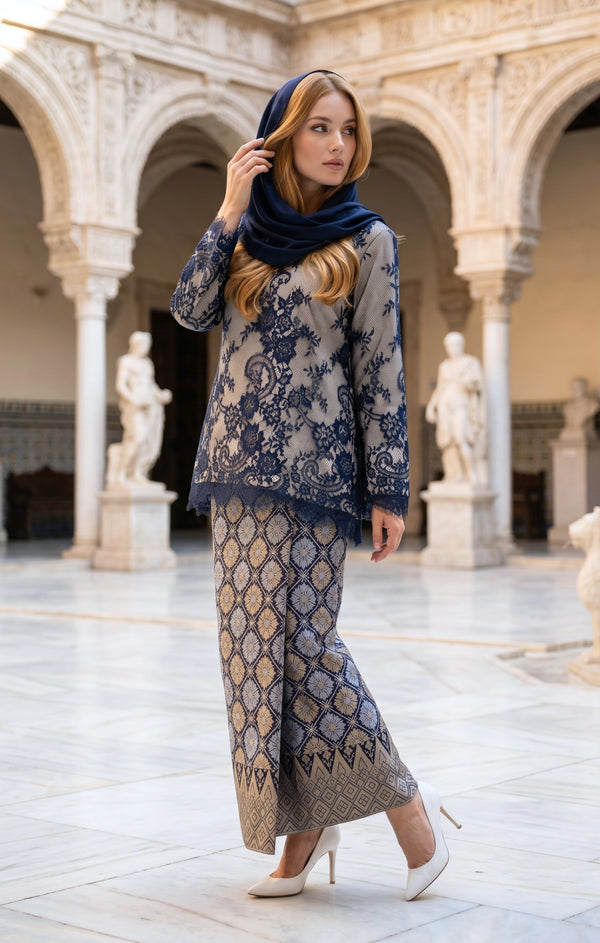 woman posing in Kurung Kedah Lace Songket Blue Black featuring full songket skirt styling