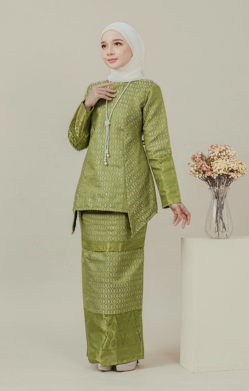 Side view C Luxe Kurung Kedah Olive highlighting long straight sleeve and silhouette