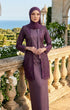 styling kebaya Kutu Baru Dusty Magenta front view with long straight sleeve standing on a balcony with scenic background