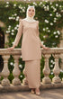 Kurung moden plain Nude full outfit view with greenery in the background