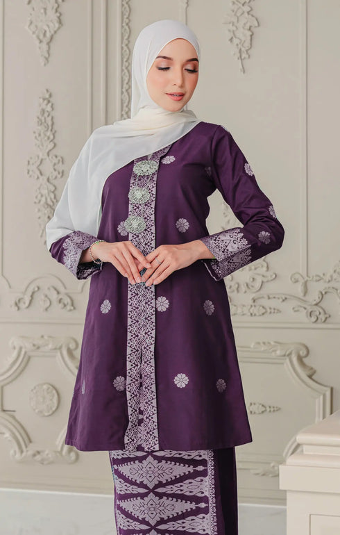 Fabric close up Kebaya Magenta Silver showing premium songket weave and silver accents