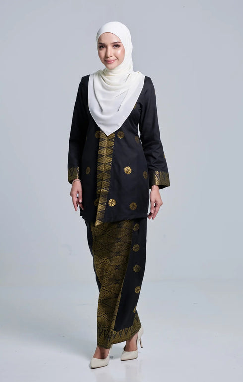 Model wearing Seroja Kebaya Black Gold displaying overall styling and drape