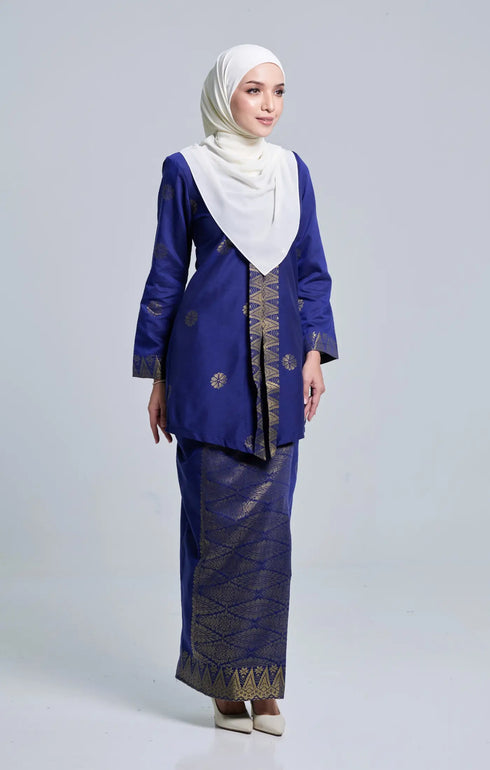 Model wearing Seroja Kebaya Royal Blue Gold displaying overall styling and drape