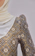 Fabric close up Kurung Moden Black Gold showing dyed brocade texture and gold accents