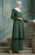 Kebarung Klasik Plain Dark Emerald Green front view model wearing V neck labuh design standing on a staircase