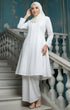 Kebarung Klasik Plain Pearl White front view model wearing V neck labuh design with a blue wall background