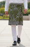 Person wearing Sampin Instant Kasturi Tenun Olive Green Silver with Baju Melayu traditional outfit front view showing full woven pattern