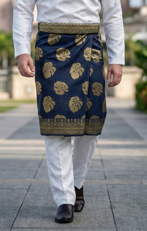 Man wearing Sampin Instant Kasturi Tenun Navy Blue Gold with Baju Melayu traditional outfit close-up showing embossed tenun fabric detail