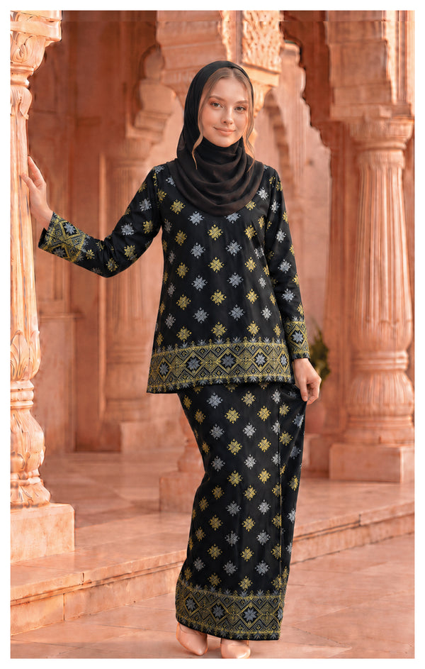 Woman wearing Kurung Kedah Black front view songket round neck design