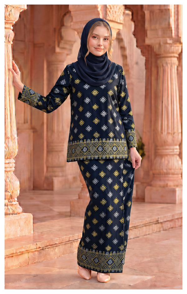 woman wearing Kurung Kedah Blue Black front view songket round neck design