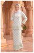 Woman wearing Kurung Kedah Pearl White front view songket round neck design