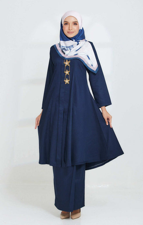 Model wearing Kebarung Klasik Navy Blue displaying overall styling and drape