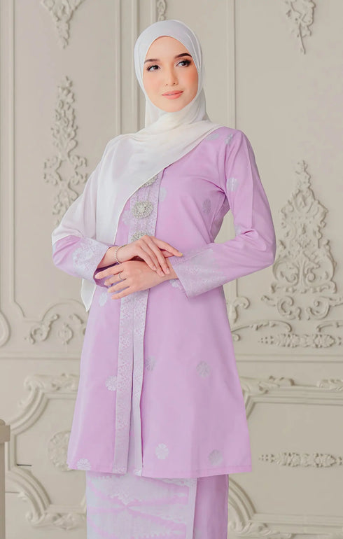 Model wearing Kebaya Lilac Purple Silver displaying overall styling and drape