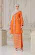 Woman wearing a traditional outfit Kebaya Orange Silver highlighting long sleeve and slim with a Instant Shwal white hijab in a decorated room.
