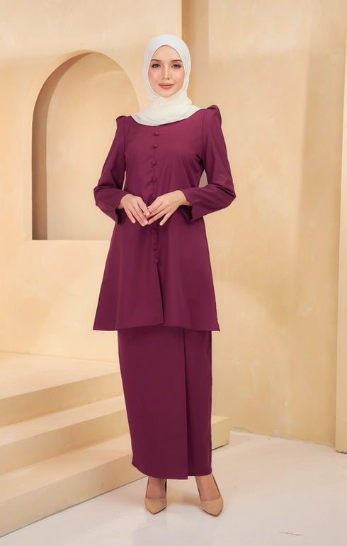 Kurung Riau Plain Magenta styling shot showing round V neck and sleeve details