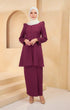 Kurung Riau Plain Magenta styling shot showing round V neck and sleeve details