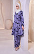 Model wearing Baju Kebarung Pasley Dusty Blue displaying overall styling and drape
