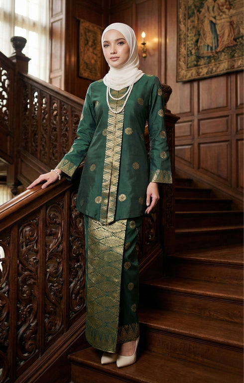 Model wearing Seroja Kebaya Dark Emerald Green Gold displaying overall styling and drape