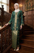Model wearing Seroja Kebaya Dark Emerald Green Gold displaying overall styling and drape