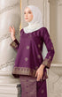 Fabric close up Kurung Kedah Magenta Gold showing woven songket texture and gold highlights