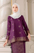 Close up Aryana Kurung Kedah Magenta Gold showing woven songket texture and gold highlights