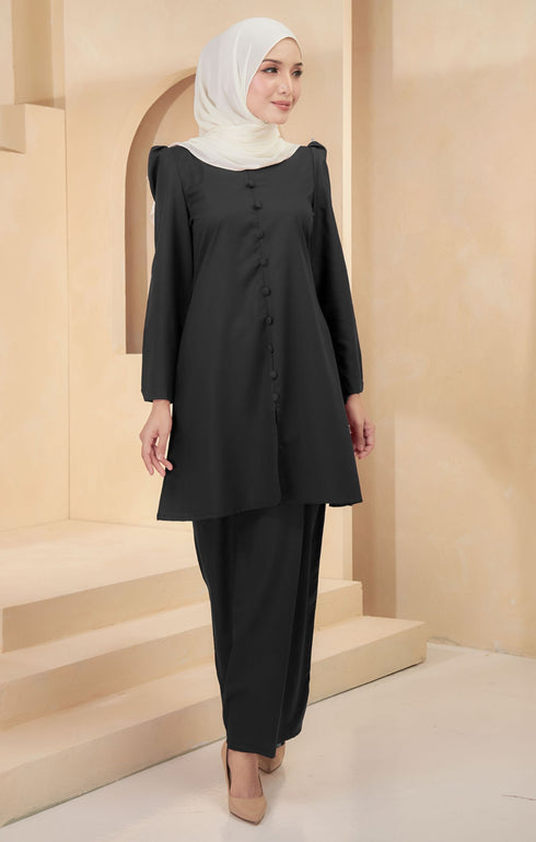 Kurung Riau Plain Black styling shot showing shoulder puff and long straight sleeves