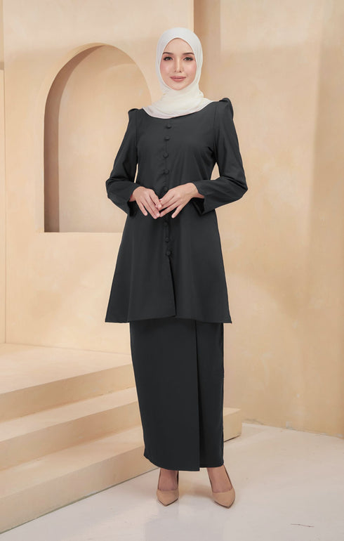 Kurung Riau Plain Black front view on model showing round V neck and button front cut