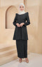 Kurung Riau Plain Black front view on model showing round V neck and button front cut