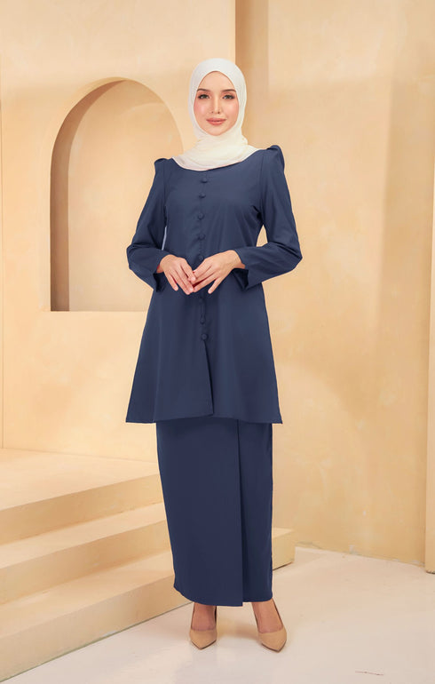 Kurung Riau Plain Navy Blue styling shot showing shoulder puff and long straight sleeves