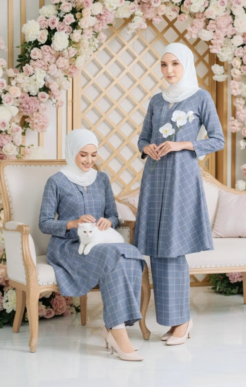 Model wearing Aruna Kebarung Linen Ash Blue Check D4-6 displaying full drape and styling