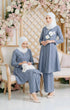 Model wearing Aruna Kebarung Linen Ash Blue Check D4-6 displaying full drape and styling