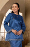 Teal blue Kurung Kedah fabric close-up
