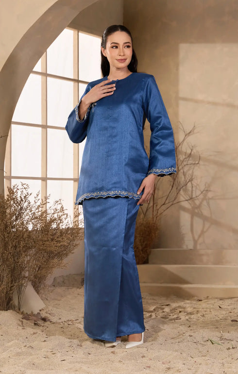 Model in teal blue Sophia Kurung Kedah