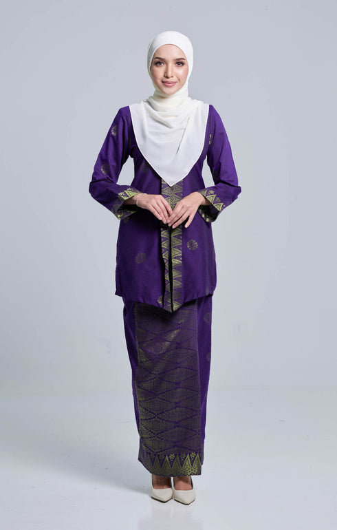 Model wearing Seroja Kebaya Purple Gold displaying overall styling and drape