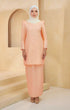 Kurung Moden Plain Peach front view on model showing round neck and puff shoulders