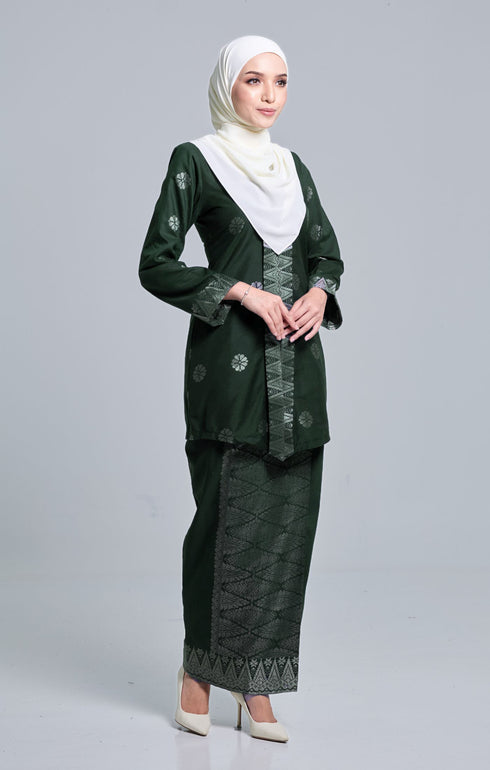 Model wearing Seroja Kebaya Dark Emerald Green Silver displaying overall styling and drape